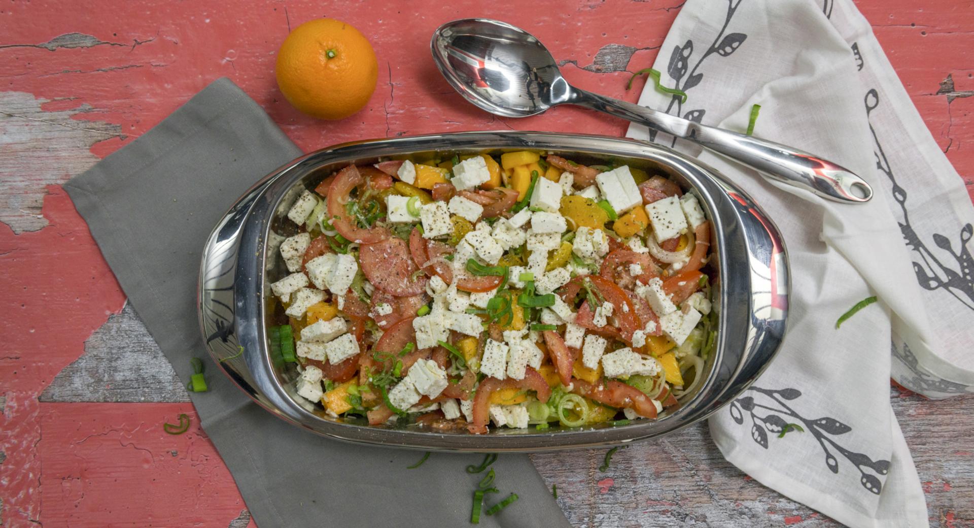 Tomato salad with orange and feta cheese 