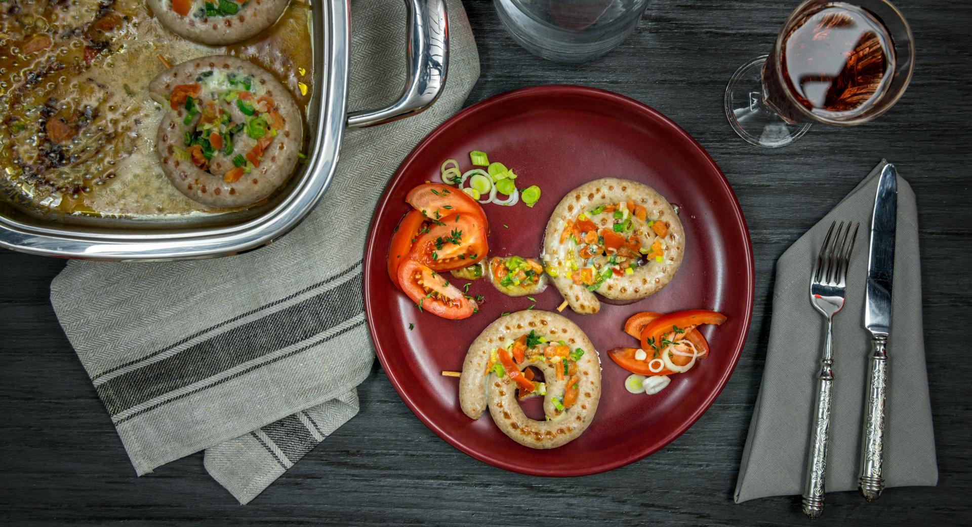 Bratwurst spirals with Gorgonzola topping 