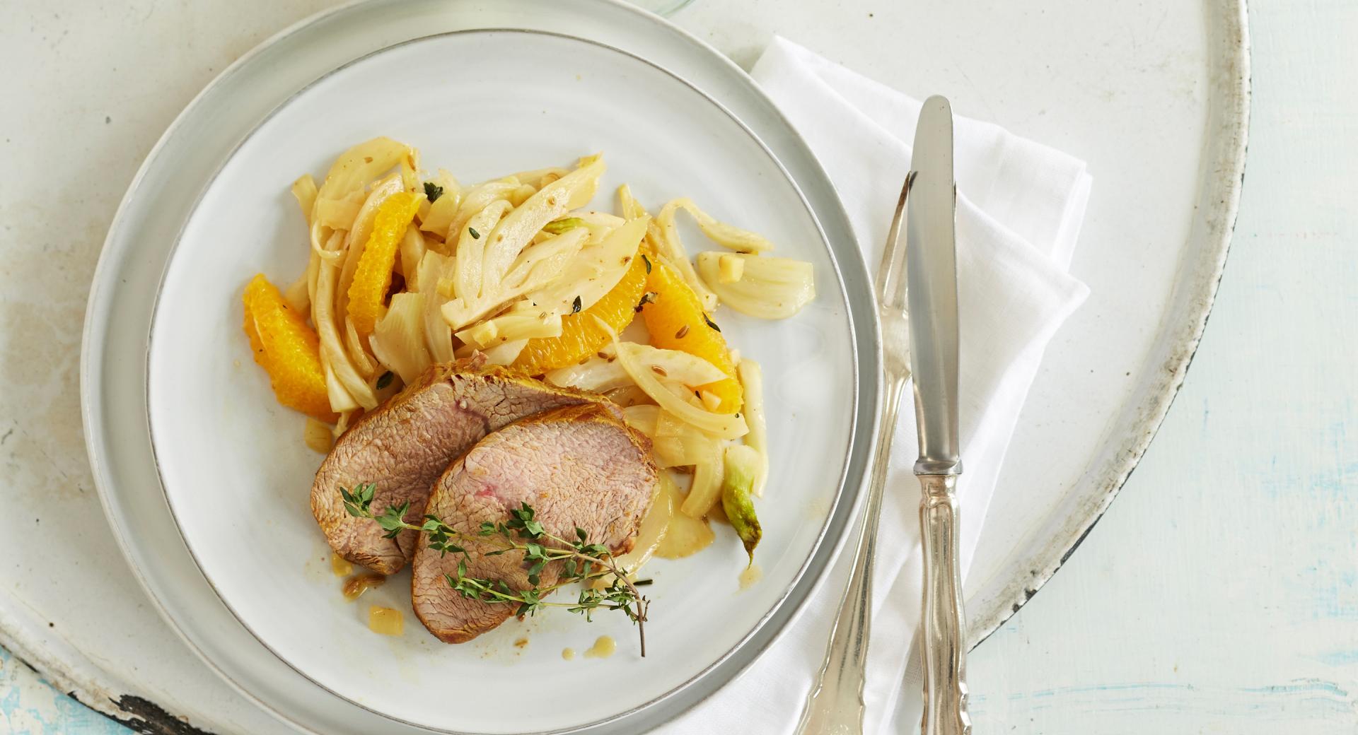 Pork fillet on orange and fennel vegetables