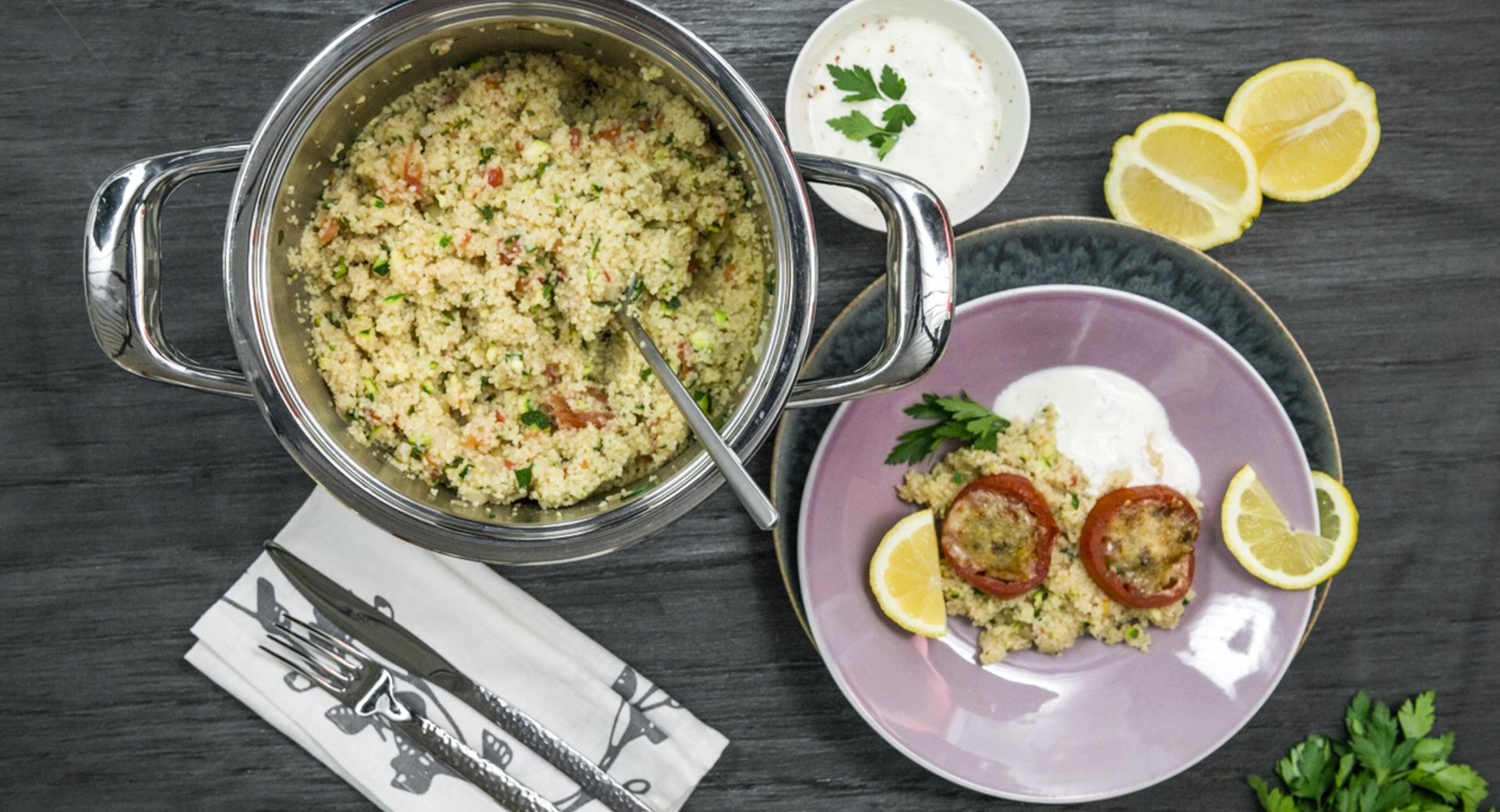 Vegetable couscous with gratinated tomatoes