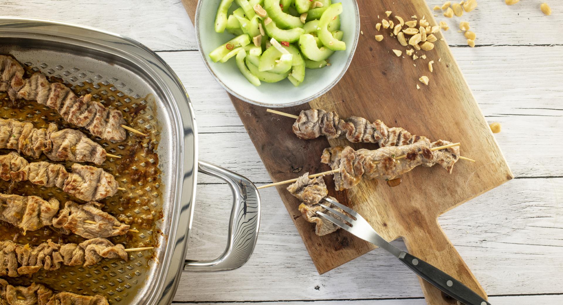 Beef skewers with spicy cucumber salad