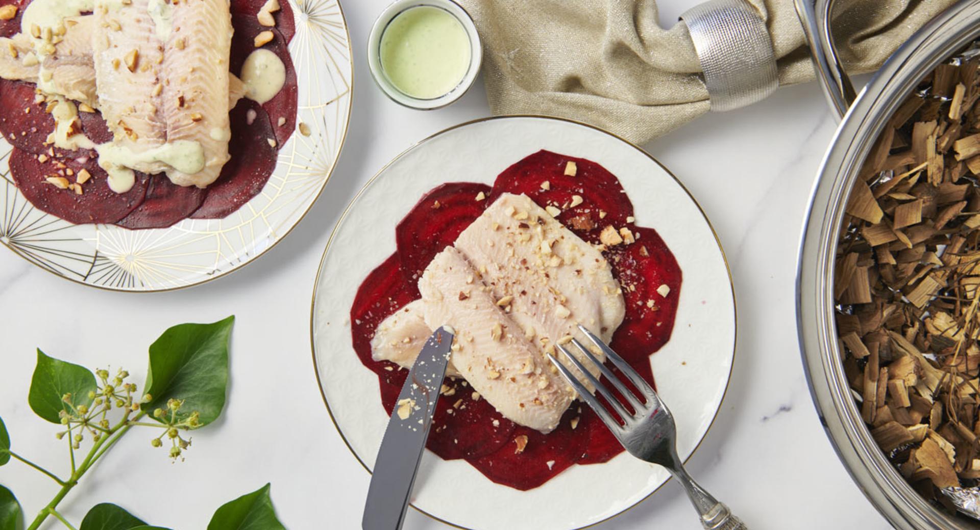 Smoked trout fillets on beet carpaccio