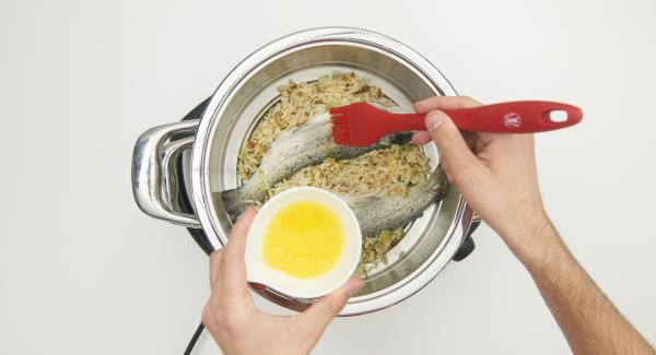 At the end of the cooking time, brush the trout with melted butter. Mix pepper, ginger powder, sugar and cinnamon and sprinkle over the trout.