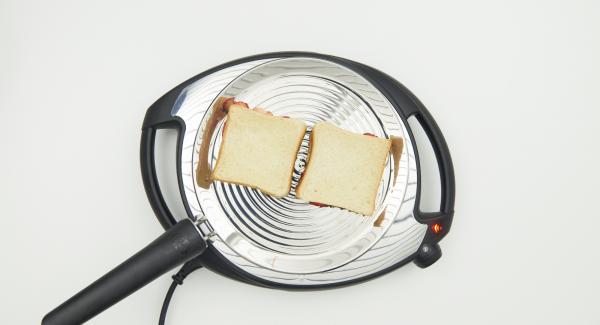 Set at low level and put toast in oPan. As soon as the toast dissolves, turn and cook from the other side.