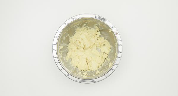 Whisk butter, sugar, vanilla sugar and the rum aroma until foamy in a large combi bowl.