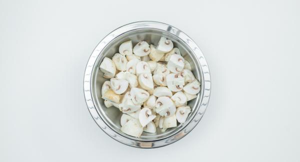 Thoroughly clean the mushrooms with a brush or cloth and halve or quarter depending on size.