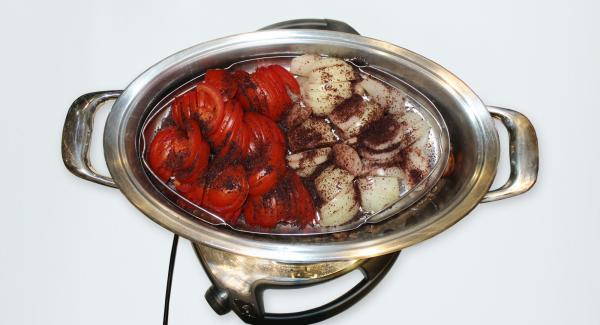 At the end of cooking time, remove the strainer from the pot and set aside.