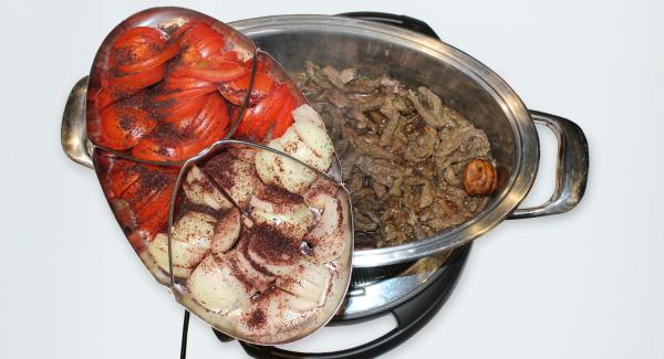 At the end of cooking time, remove the strainer from the pot and set aside.