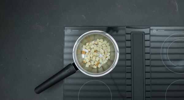 Cut the toast bread into cubes, place in a Sauteuse and place on hob. Switch hob at low level and roast until light brown while stirring.