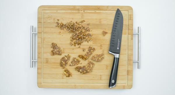 To garnish, break off small pieces of the brittle, chop the rest finely and sprinkle on the yoghurt layer. Serve garnished with brittle pieces immediately.