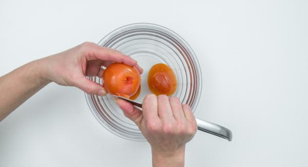 Scald the tomatoes with boiling water, peel them, cut them into small cubes.