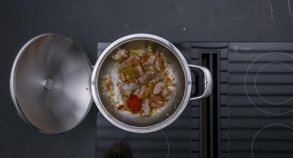 Season with salt, pepper, coriander and cumin. Add tomato paste, roast briefly and deglaze with the red wine and broth.