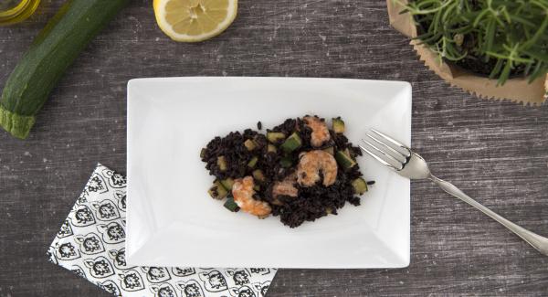 Black rice with zucchini and prawns