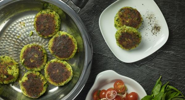 Potato burger with tomato salad