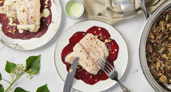 Smoked trout fillets on beet carpaccio