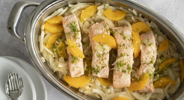 Salmon fillet on orange and fennel vegetables