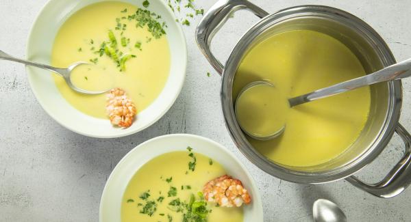 Celery cream soup with shrimp skewers